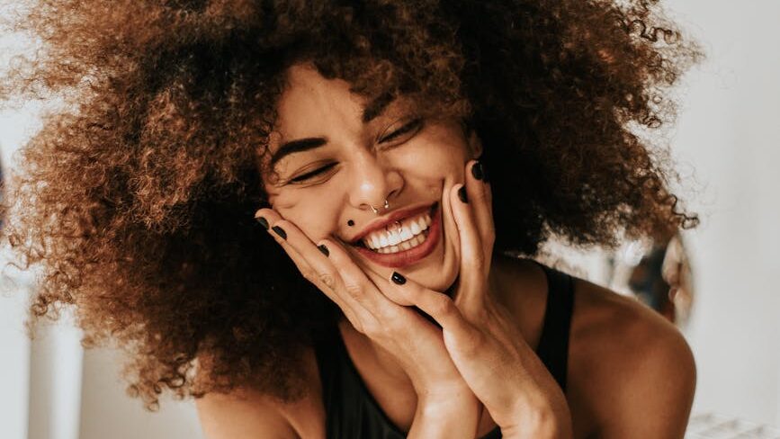 woman sitting and smiling